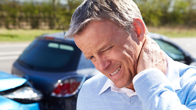 Man with neck pain after auto accident